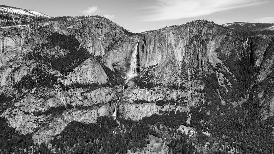 View of yosemite national park valley with el capitan, half dome, and waterfall in the summer