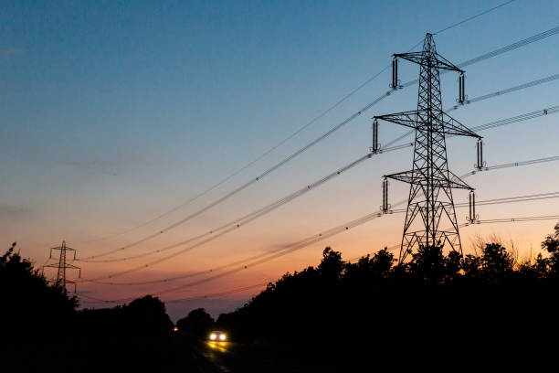 British Electricity Power Pylons At Sunset