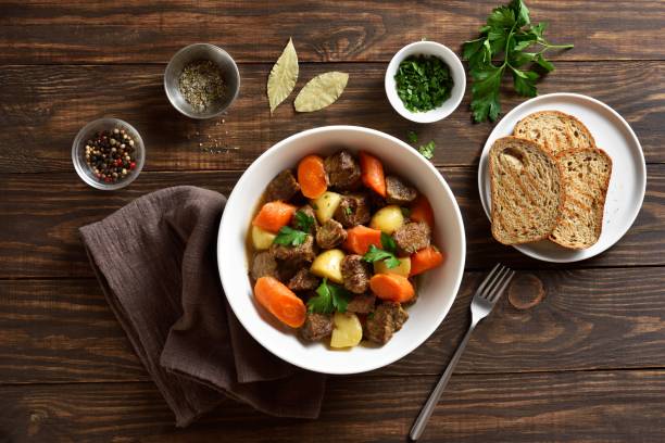 istock Beef meat stewed with potatoes, carrots and spices 1983074148