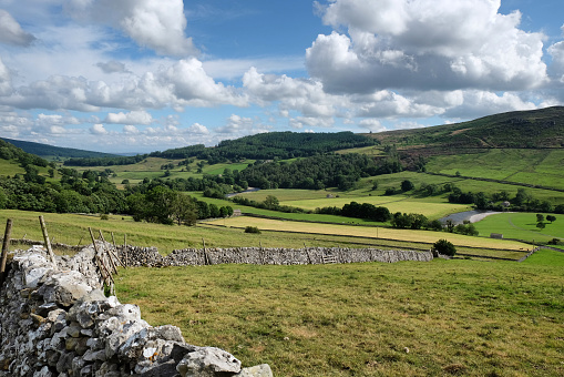 Drystone wall and view looking south over towards Kail Hill near Burnsall, in the Yorkshire Dales, North Yorkshire.