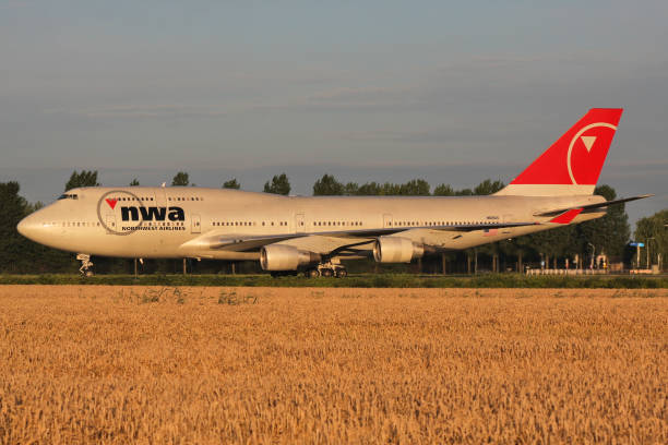 Hoofddorp, Netherlands - August 2, 2008: Northwest Airlines Boeing 747-400 with registration N669US rolling on taxiway V of Amsterdam Airport Schiphol