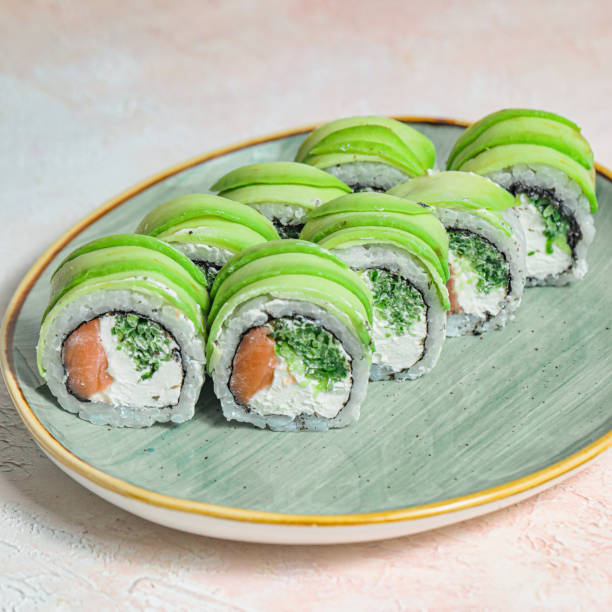 istock Freshly Made Sushi Platter on Wooden Table 1983087223