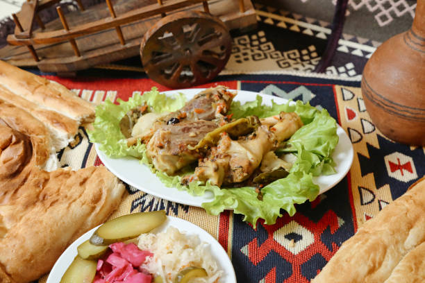 istock Table With Plates of Food on Rug 1983089571