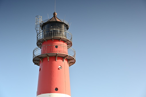 Historic lighthouse in Büsum against a blue sky
