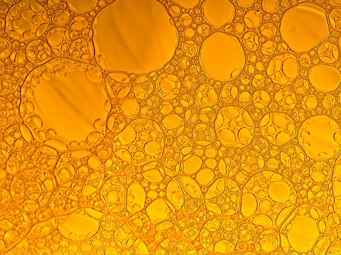 Orange bubble pattern macro for use as abstract background.