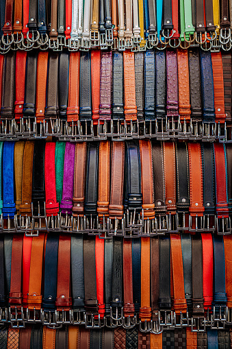 Italian leather belts, often found in shops along the streets, are renowned for their exceptional craftsmanship and high-quality materials. These stylish accessories are a testament to Italy's longstanding tradition of producing luxury leather goods.