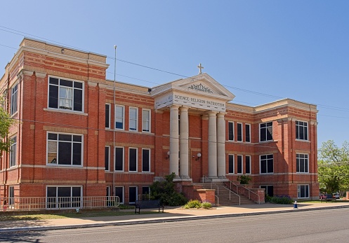 Fredericksburg, Texas - USA, April 28, 2023. Science, Religion, Patriotism building of the Saint Mary's Catholic School in downtown Fredericksburg,Texas