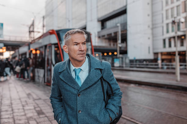 istock Handsome dutch businessman at a public transport hub 1983416936