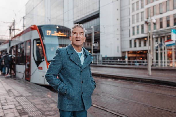 istock Handsome dutch businessman at a public transport hub 1983417441