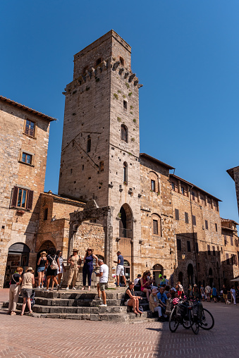 San Gimignano, Italy - September 20, 2023 - Piazza della Cisterna in downtown San Gimignano, Italy