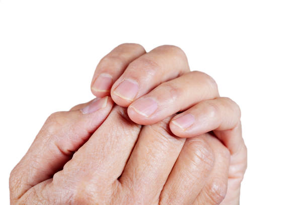 Close up of a hand holding another hand
