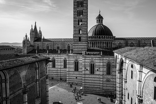 Siena, Italy - September 11, 2023 - The Siena cathedral and its cupola, seen from the Facciatone panoramic viewpoint, Italy