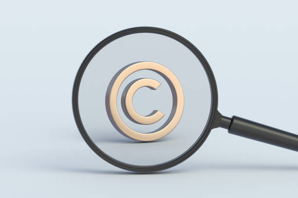 istock Copyright sign behind magnifying glass. 3d render 1983486384