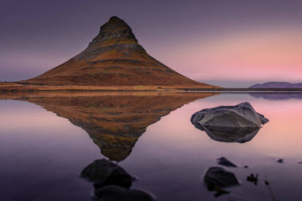 istock Twilight over the Kirkjufell reflected on the  lake, Iceland 1983501251