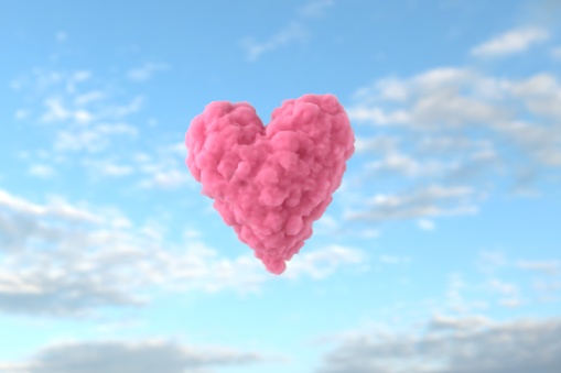 3D pink heart shape cloud on a sunny day in the sky as a celebration of a valentines day