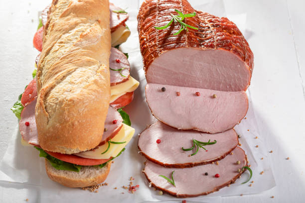 istock Delicious sandwich with ham, cheese and chive. 1983536546