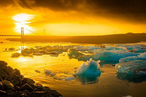 Spectacular sunrise over the bridge of the Jokulsarlon Glacier Lagoon, Iceland