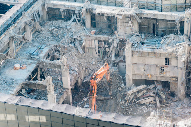 Buildings collapsed and damaged in the earthquake and debris removal works.