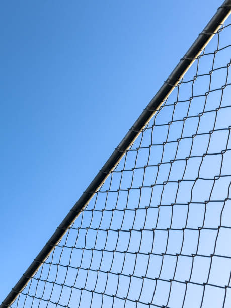 istock Chainlink Fence and Blue Sky 1983633043