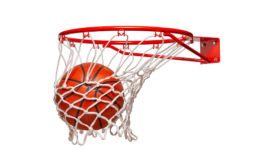 Basketball falling into the net on a hoop isolated on a white background