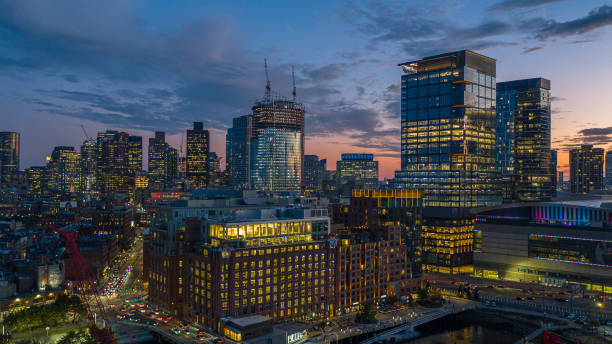 marina boston harbor with a view of modern appartments and new house under construction at sunset. - boston aerial view charles river residential structure 뉴스 사진 이미지