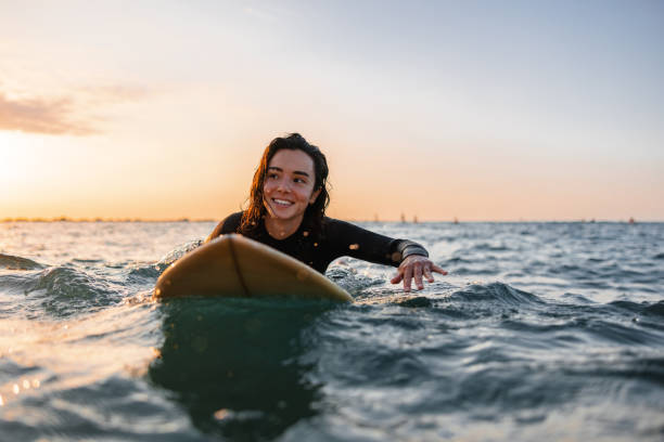 May 10, 2019. Bali, Indonesia. Surfer man rides on surfboard at barrel wave. Professional surfing in ocean