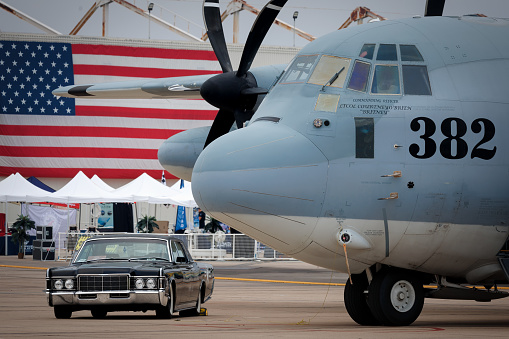 Miramar, California, USA - September 24, 2023: Marine Aerial Refueler Transport Squadron 352 displays a C-130 Hercules and a 1969 Lincoln Continental at America's Airshow 2023.