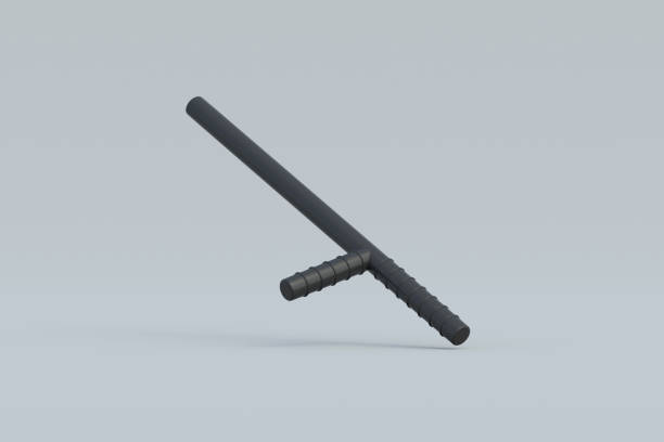istock Falling police baton on gray background. Security accessories. Defence tool. Policeman ammunition. 3d render 1983839740