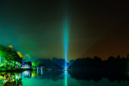 Light beam in the lake at night, Chiang Mai Province.