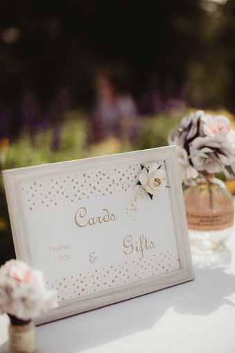 Gift box with flowers at an outdoor wedding