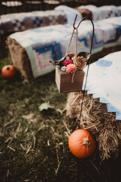 Rustic wedding with pumpkins and haystack