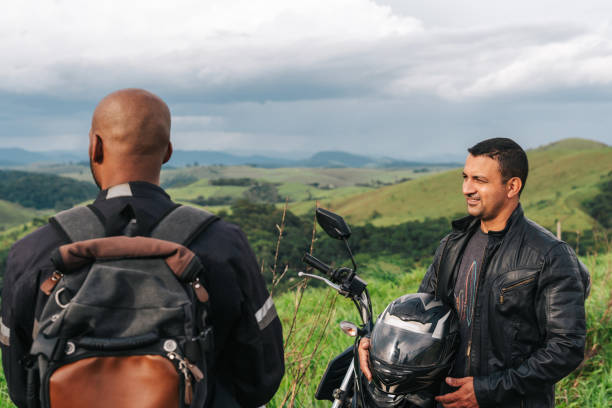 Motorcyclists taking a break in the countryside