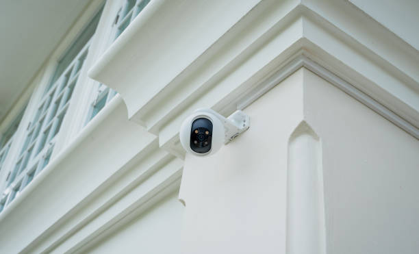istock Modern CCTV camera on a wall of a residential building 1984193053
