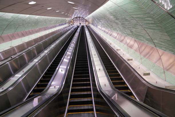 istock Long escalator in subway station 1984225141