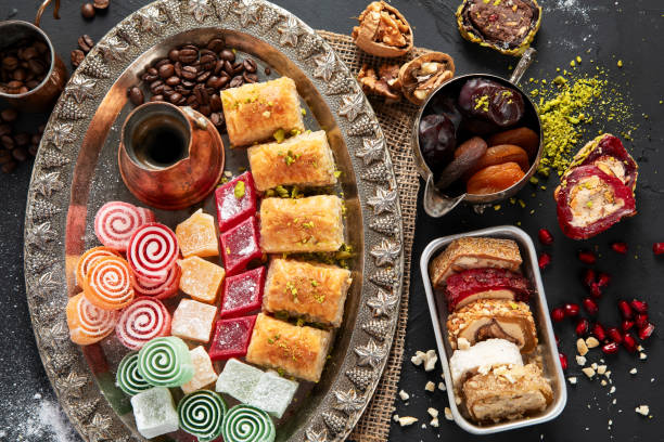 istock Traditional turkish coffee and turkish delight on dark  background. 1984248874
