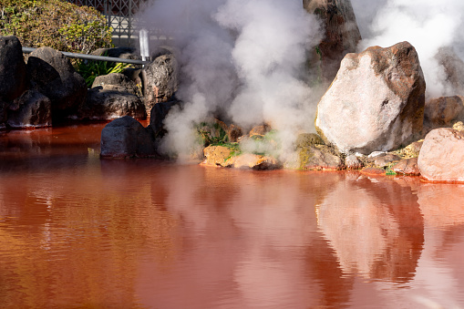 A pond of boiling, red water at Umi Jigoku in Beppu, Japan
