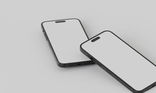 istock Smartphone with a blank screen on a white background. Smartphone mockup closeup isolated on white background. 1984303548