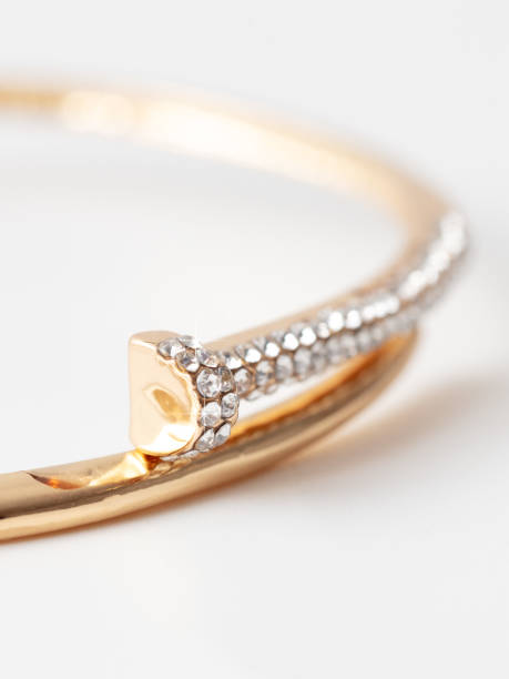 istock Gold bracelet isolated white background 1984375214
