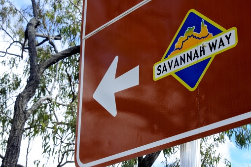 Mt Surprise, QLD - JULY 31 2023:Savana way roadsign. The Savannah Way is a route of highways and major roads across the tropical savannahs of northern Australia, linking Cairns in Queensland with Broome in Western Australia.