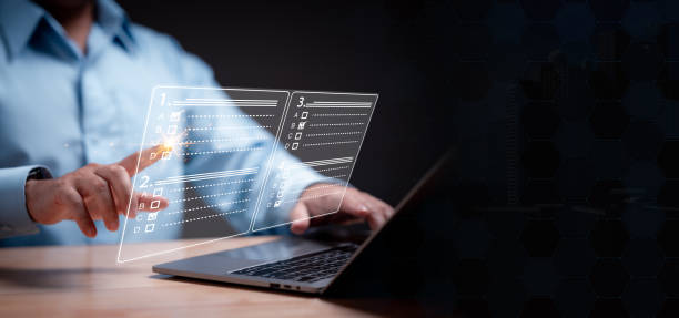 istock Choices, point, select concept. Businessman, with a decisive finger, carefully navigate the choices on an exam, questionnaire, or checklist, each selection a strategic move toward business success. 1984408900