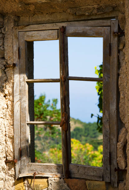 istock View through an old wooden window 1984459929
