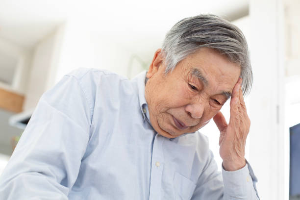 istock Japanese senior man suffering from migraine 1984462037