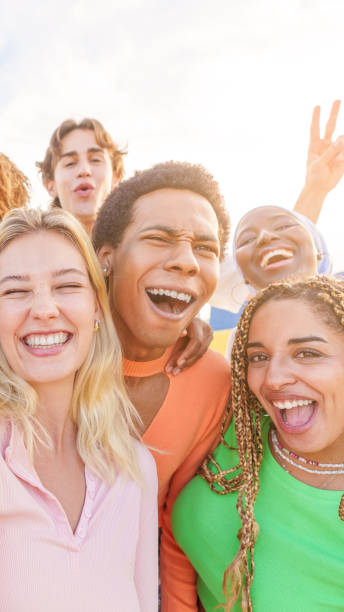 istock Friends taking selfie with multi-ethnic friends 1984463608
