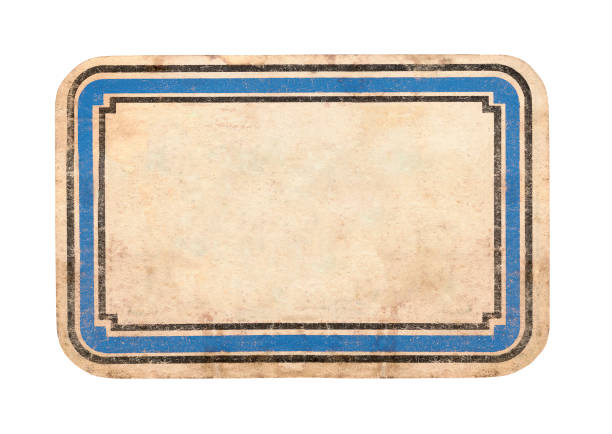 istock Old name label from a school exercise book, cut out on a white background. (Made in the first half of the 20th century) 1984469931