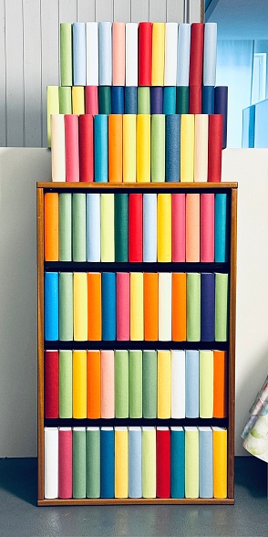 Generic book shelves, colorful