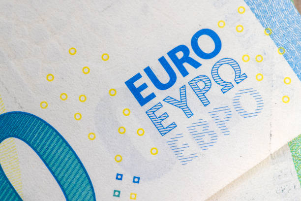 euro banknotes of the european union close-up - european union coin european union currency euro symbol coin стоковые фото и изображения