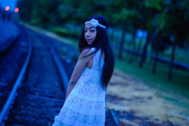 cute Thai girlfriend in white dress