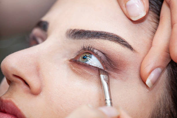 istock Makeup artist apply makeup brush for eyes. 1984550000