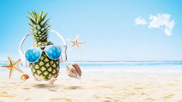 istock Cool pineapple partying at the beach 1984568551