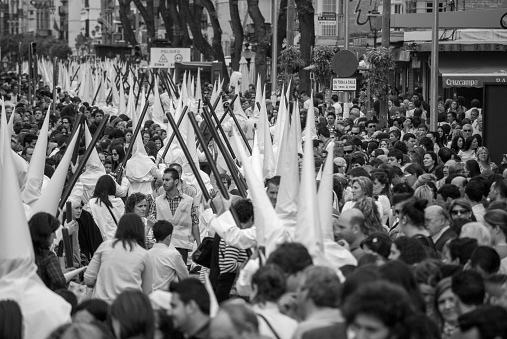 seville, Andalusia, spain,03/15/2023, penitents in the processions of the Holy Week of Easter